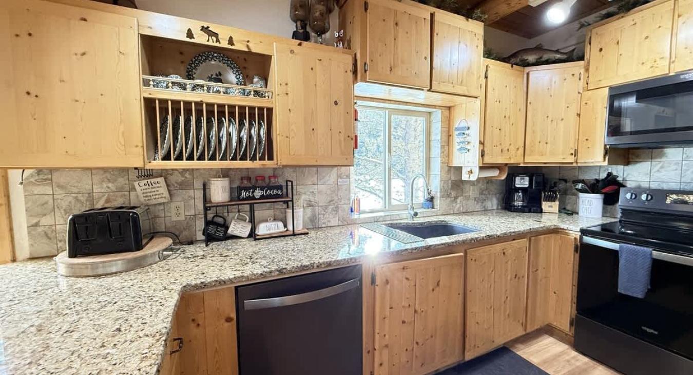 Basic appliances, cookware, dishes, and spices are provided for your convenience.