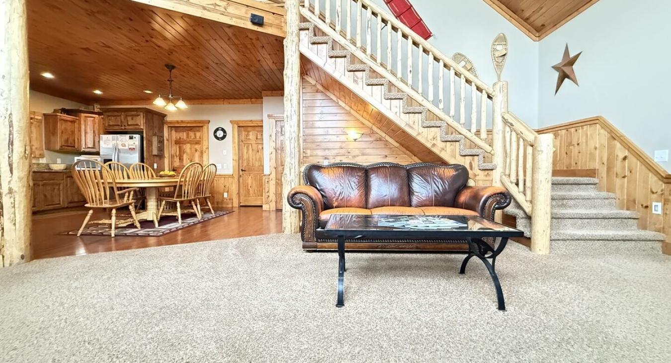 Open living area and access to the upper level.