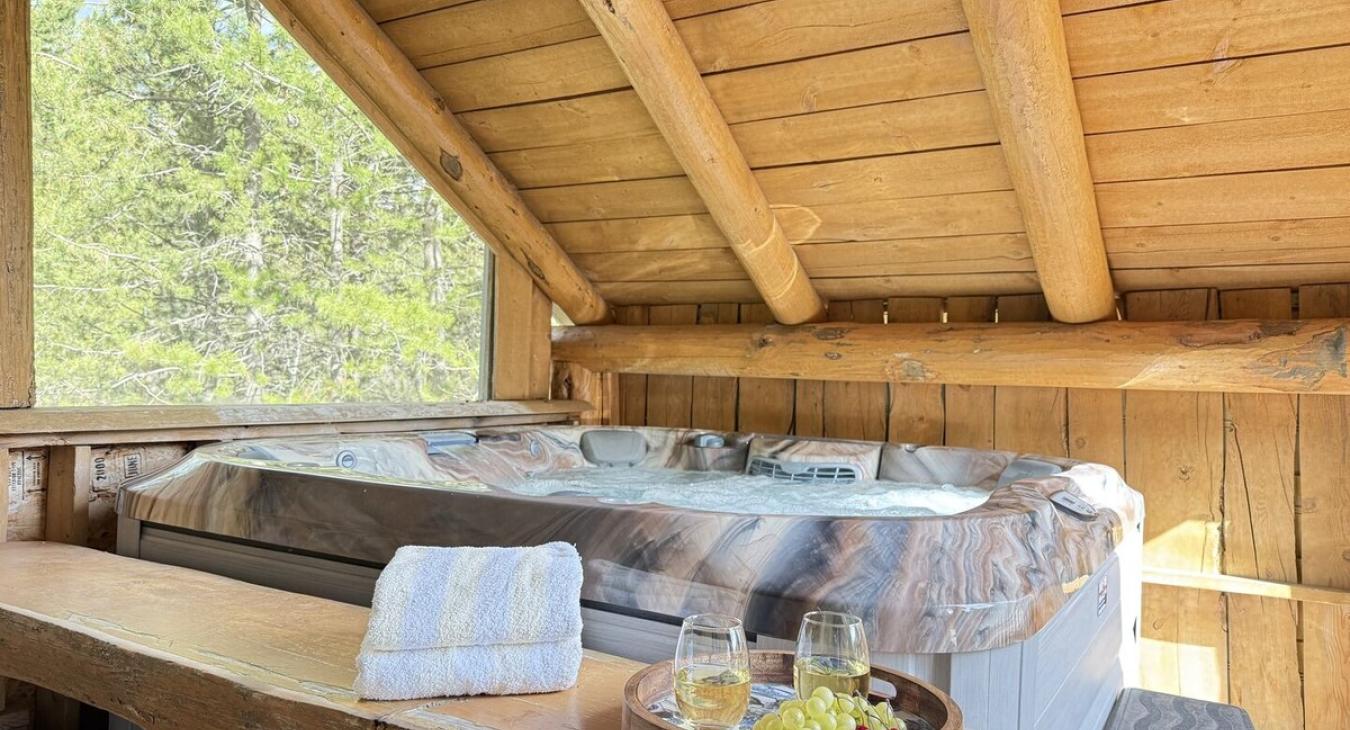 Hot tub located outside for your use during your stay.