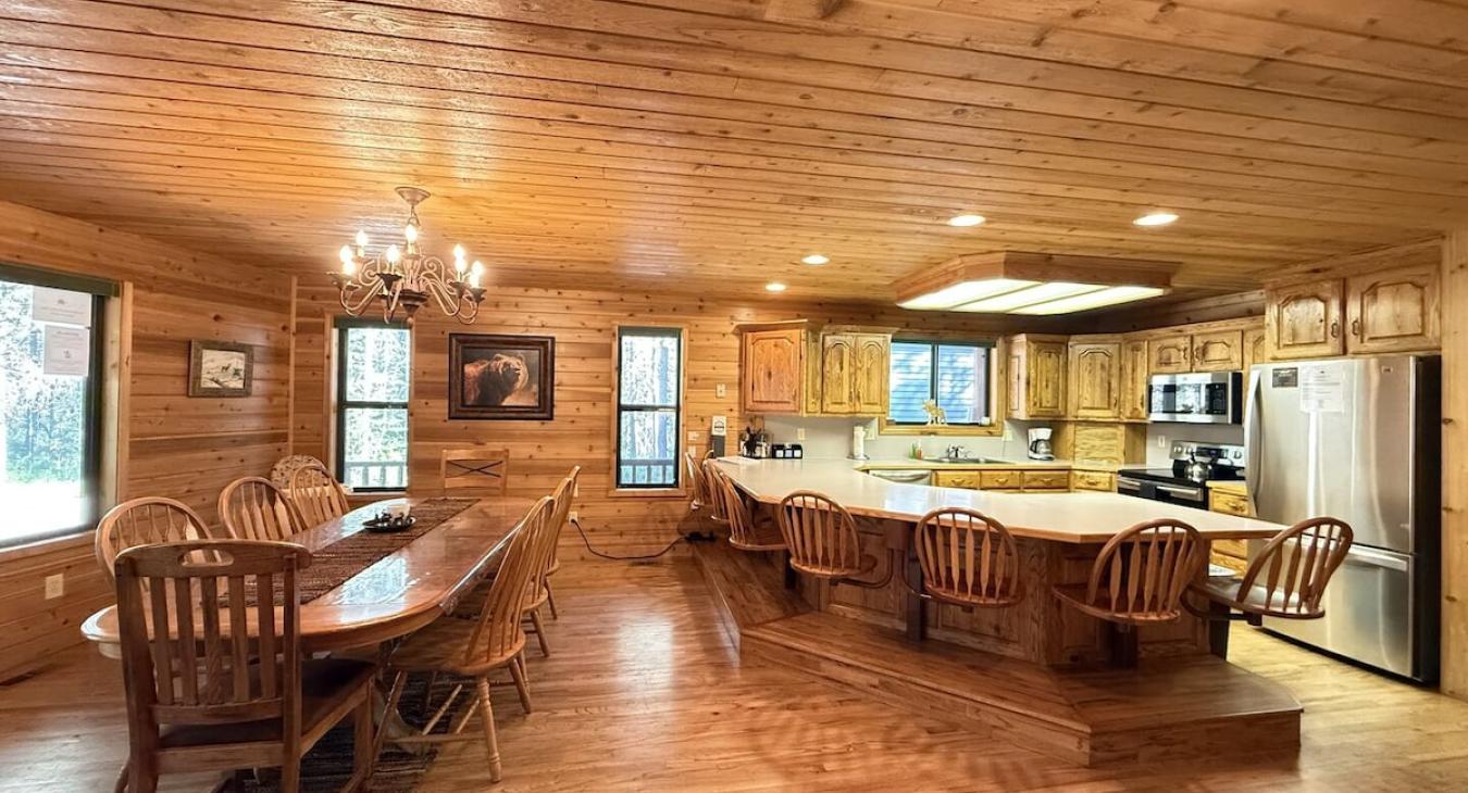 Full kitchen with appliances, dishes, and cooking essentials.