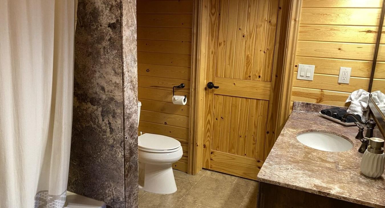 The beautiful stone accents of the cabin brings a modern feel while in the cabin.