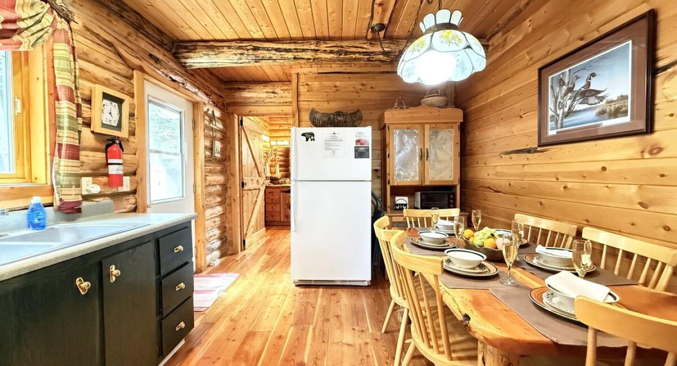 Full size kitchen with appliances, dishes, pots and pans, utensils, and basic cooking essentials.