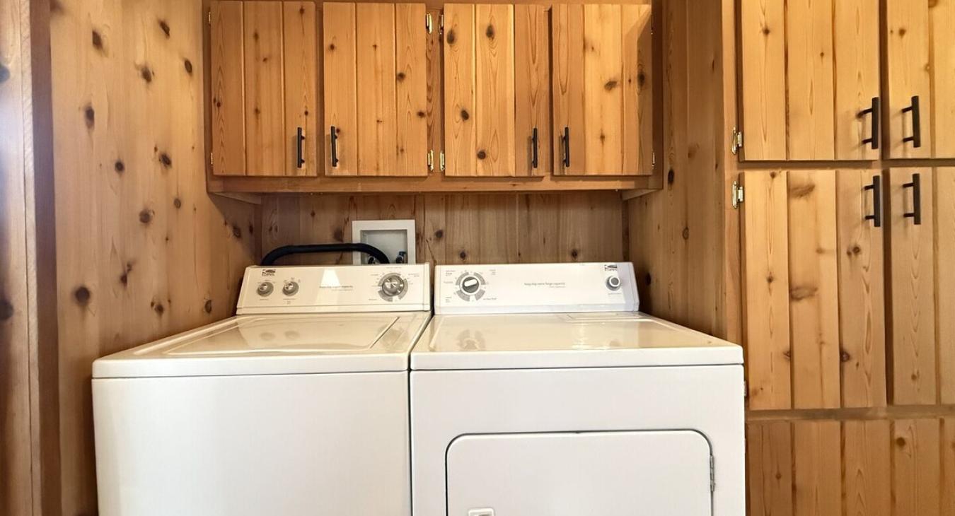 Full size washer and dryer with laundry soap provided.