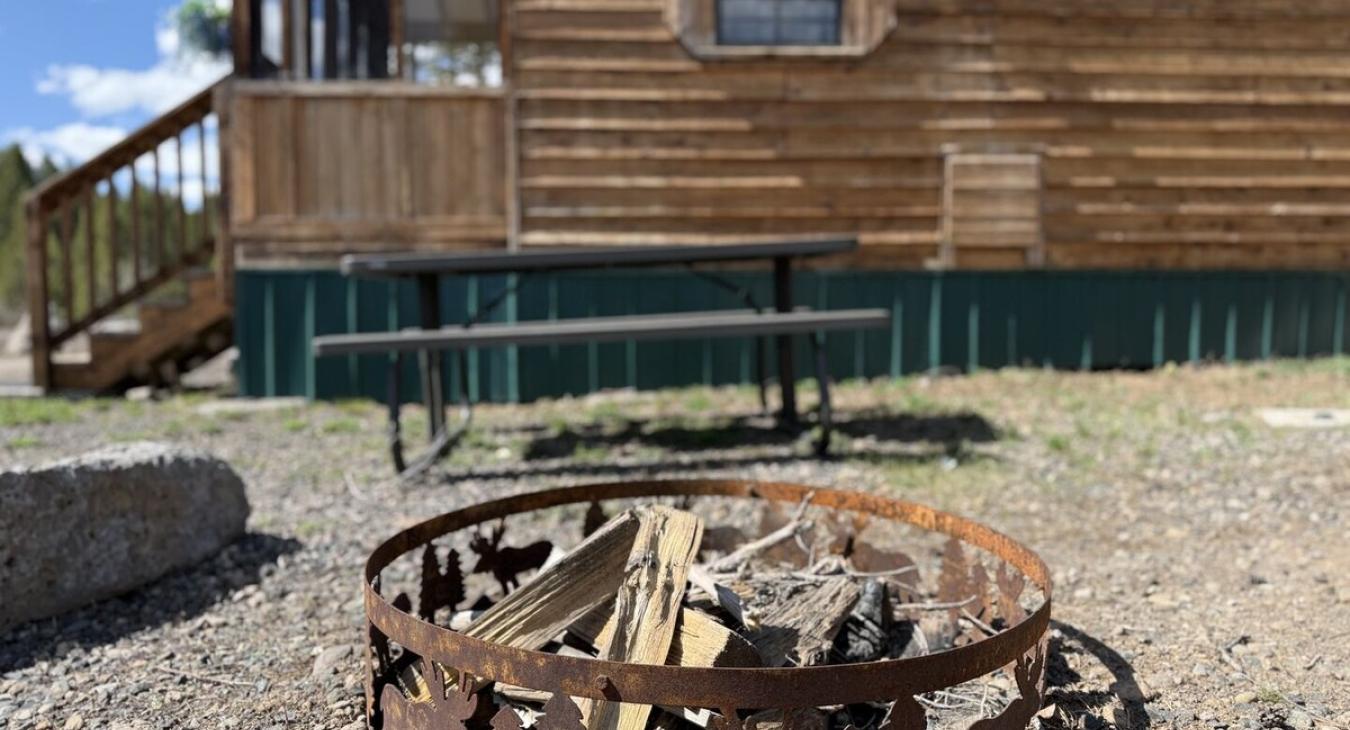 Fire pit located outside the cabin, make sure to bring your own firewood.