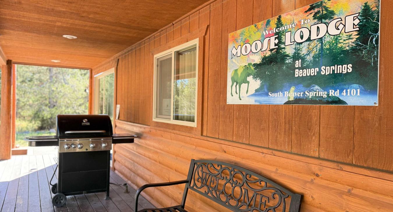 Front porch bench for sitting in the evenings and BBQ for making that perfect dinner.