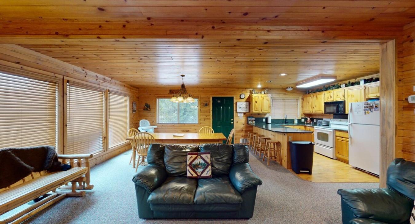 Main level living room with lots of seating.