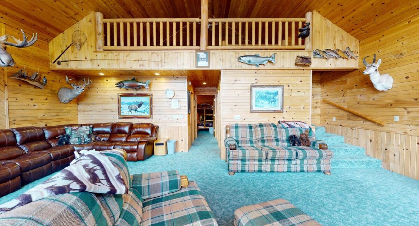 Access to the upstairs bedroom and bathrooms are through the hallway ahead.