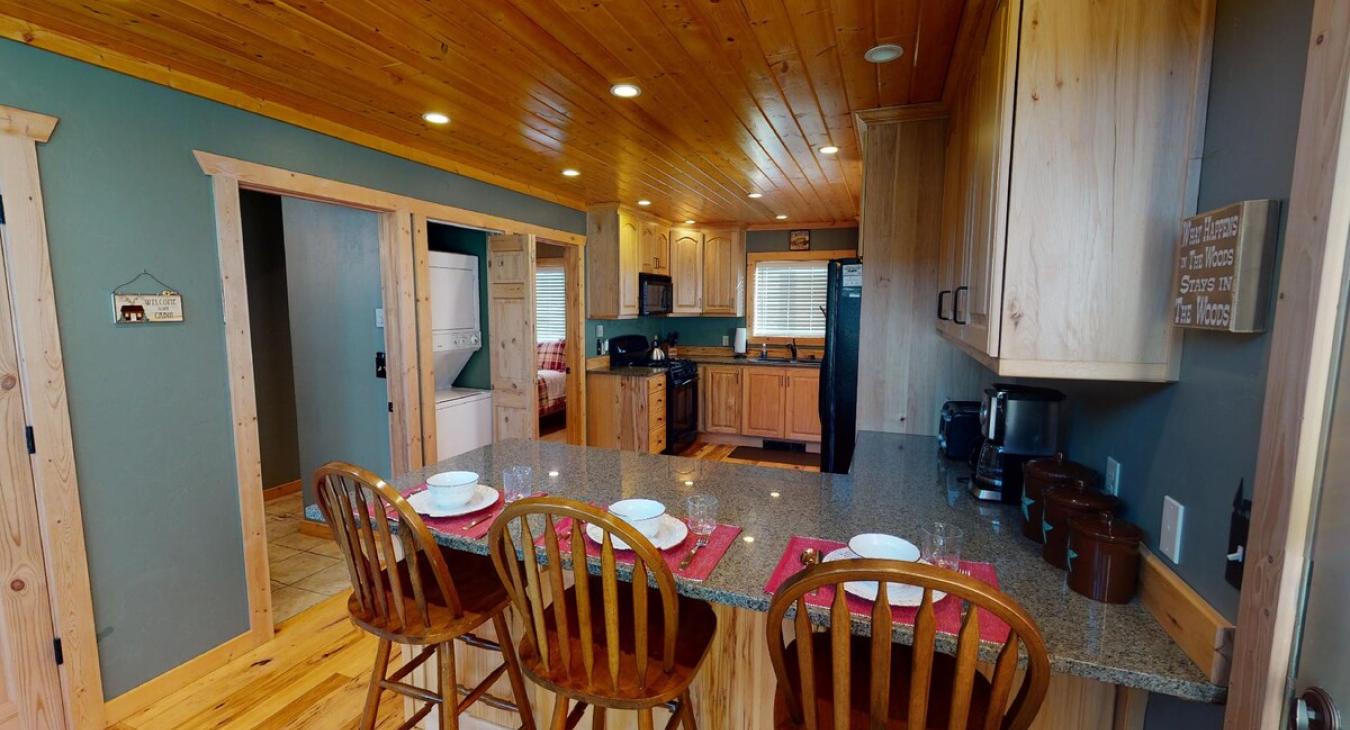 Additional seating is available at the kitchen island with 3 more seats.