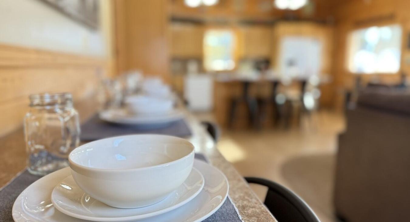 Have a nice cozy meal in the cabin with enough seating for everyone.