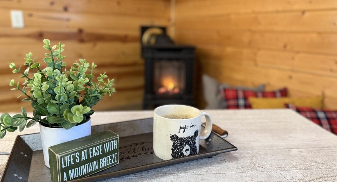 Enjoy a cup of coffee by the fire.
