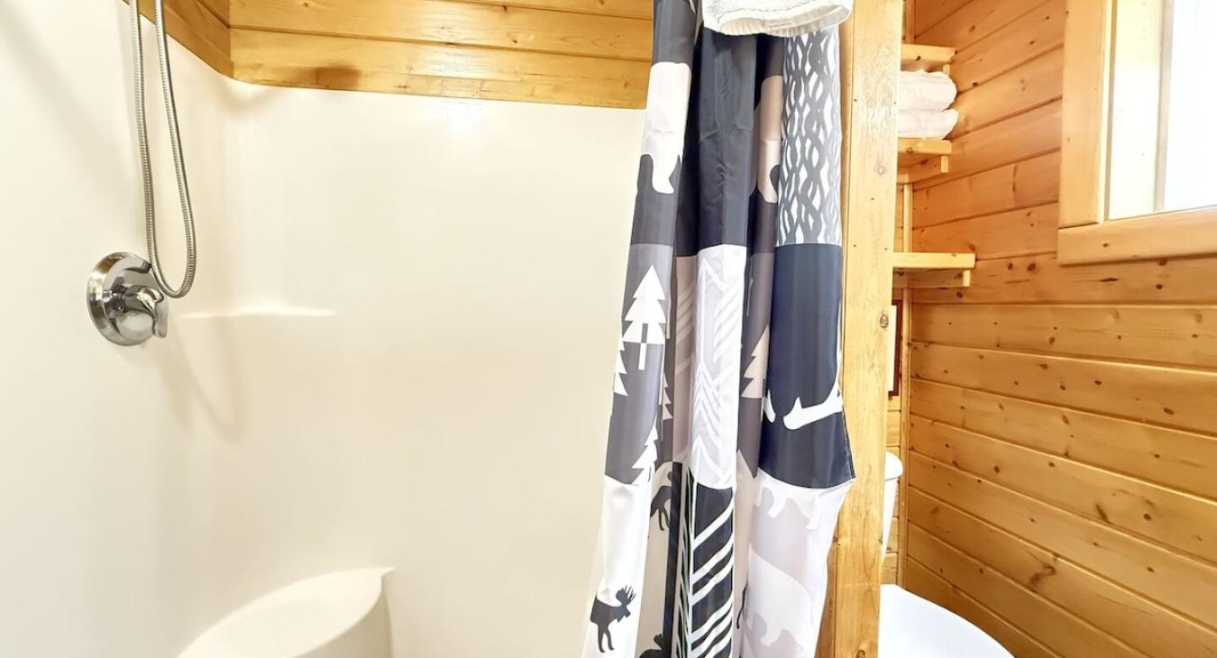 Storage is available above the toilet to store your belongings during your stay.