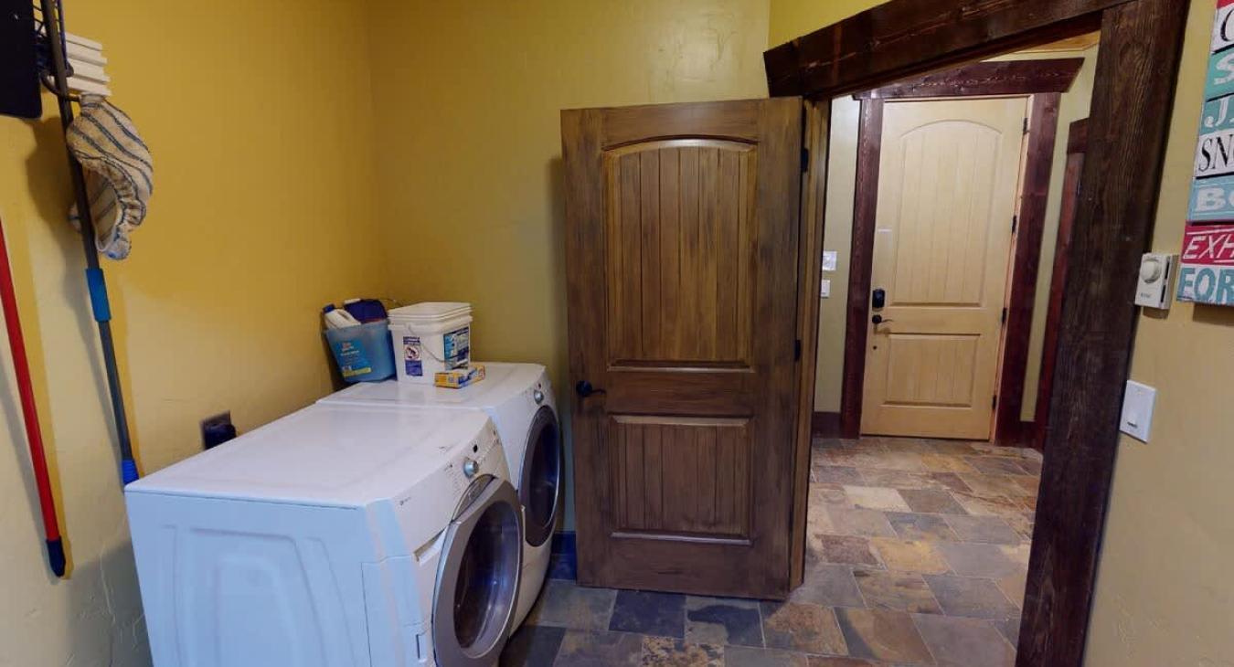Laundry room on the main level with full size washer and dryer. Laundry soap is provided.