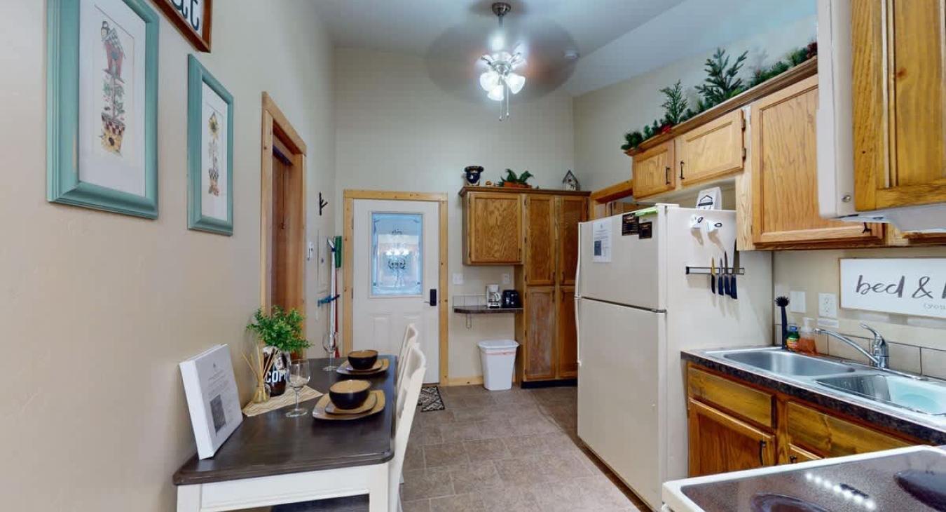 The kitchen has full amenities, dishes, basic cookware and spices for you to use.