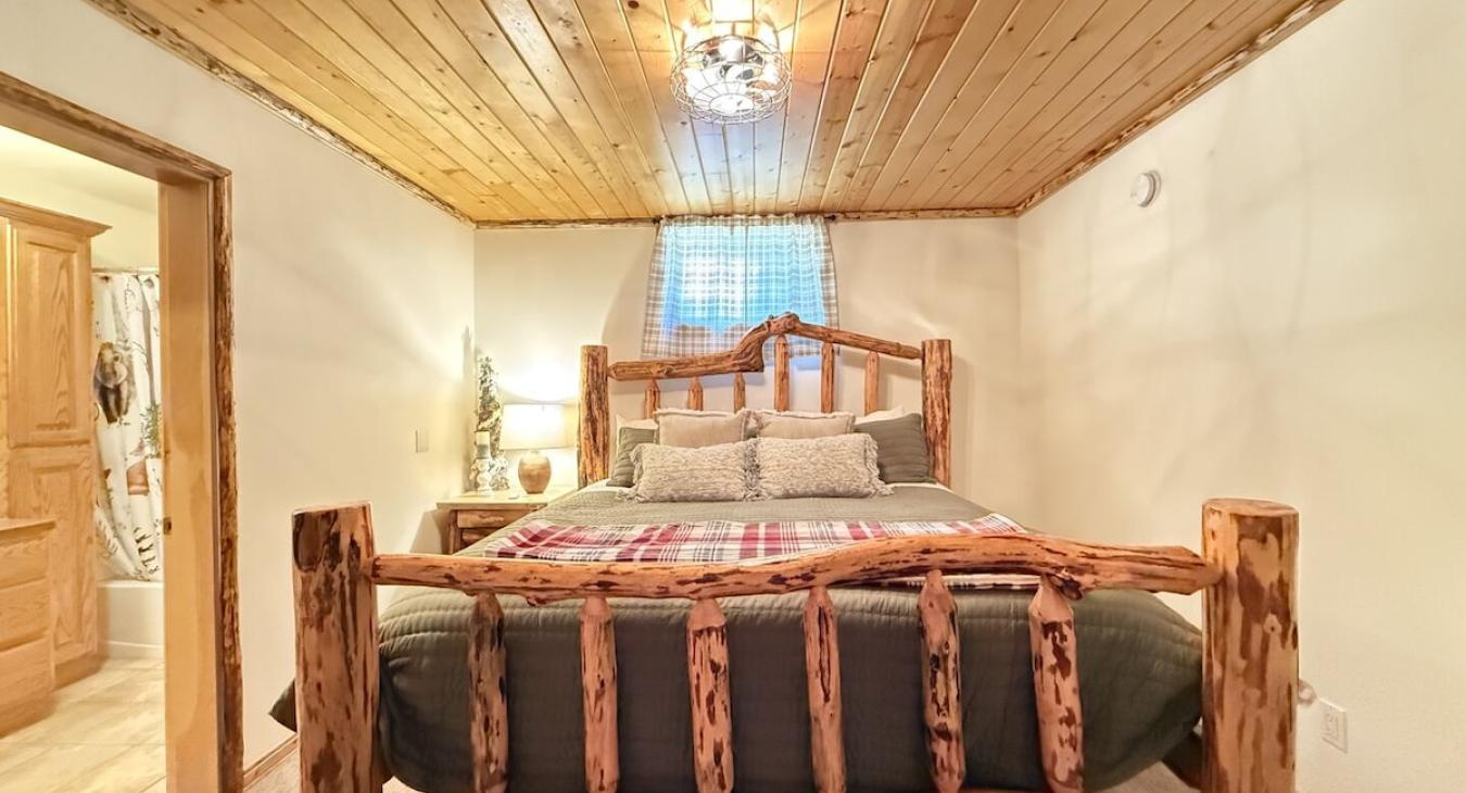 Master bedroom with a King size bed.