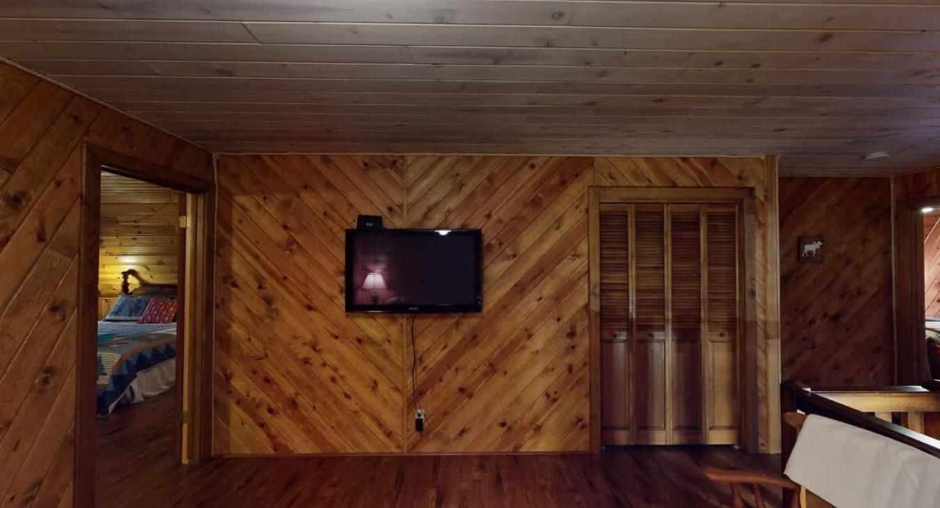 Loft is equipped with a TV for entertainment.