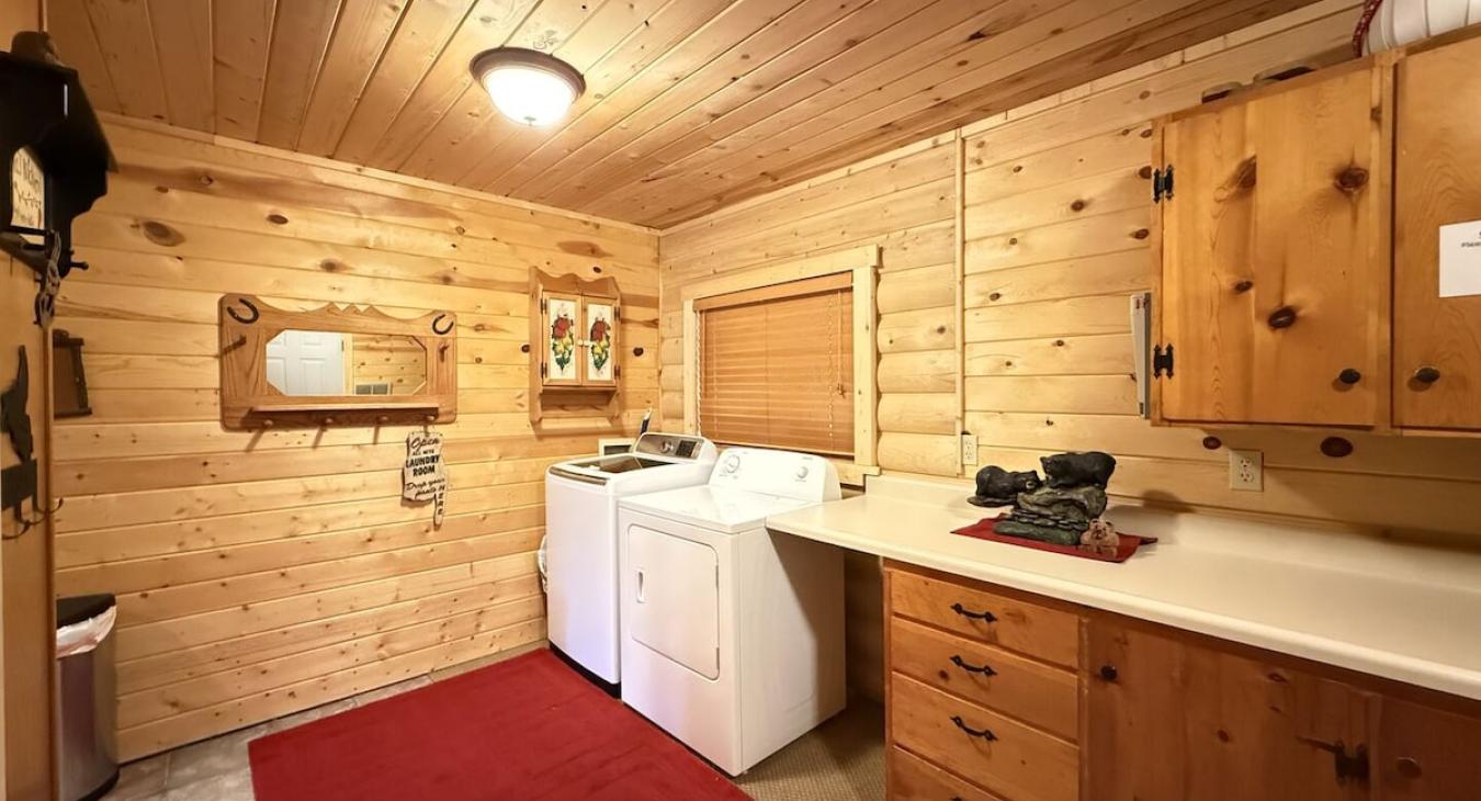 Mudroom/ Laundry room. BBQ grill just outside the side door.