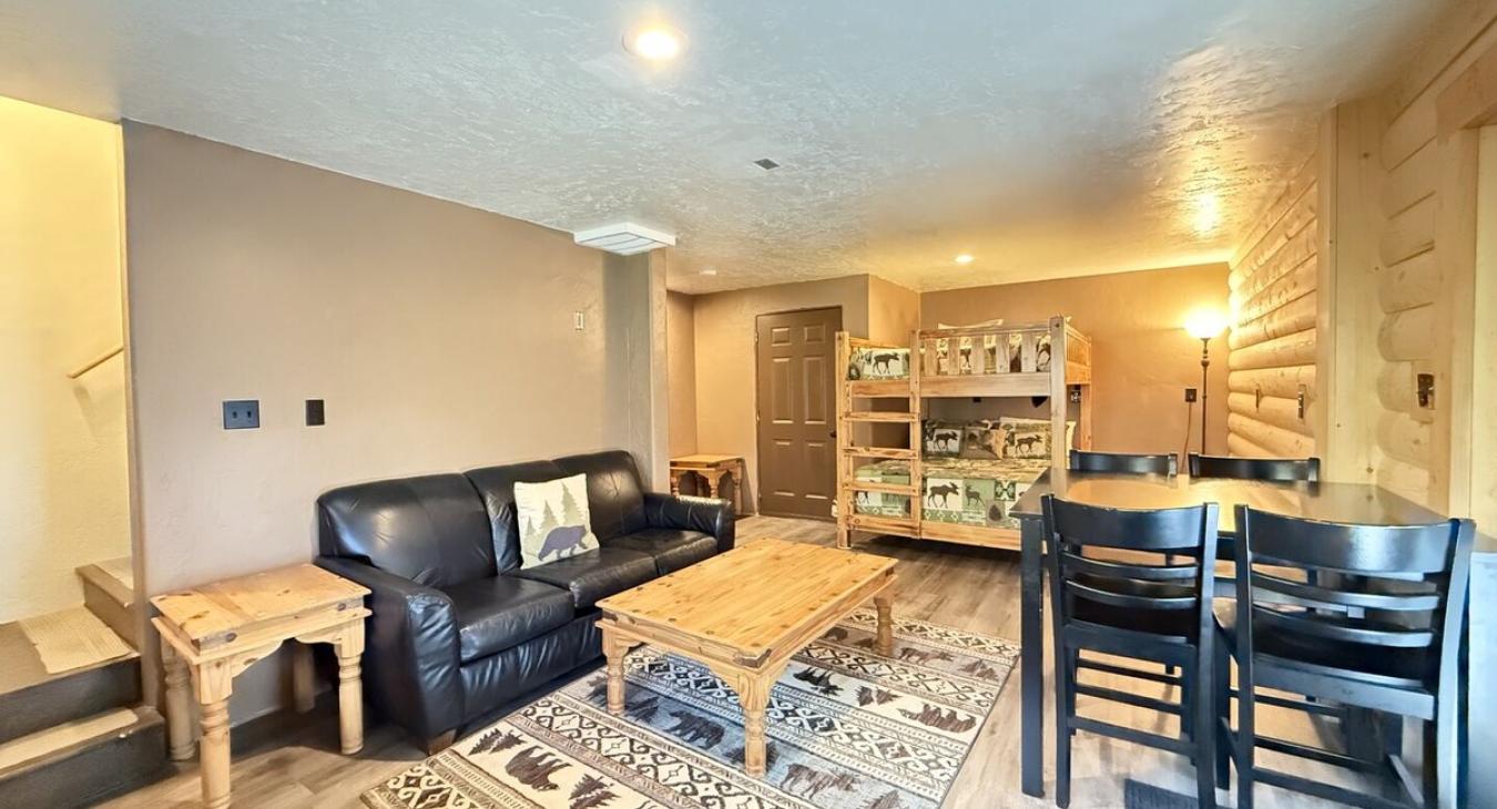 Small additional living area with seating and another bunk bed perfect for 2 more people.