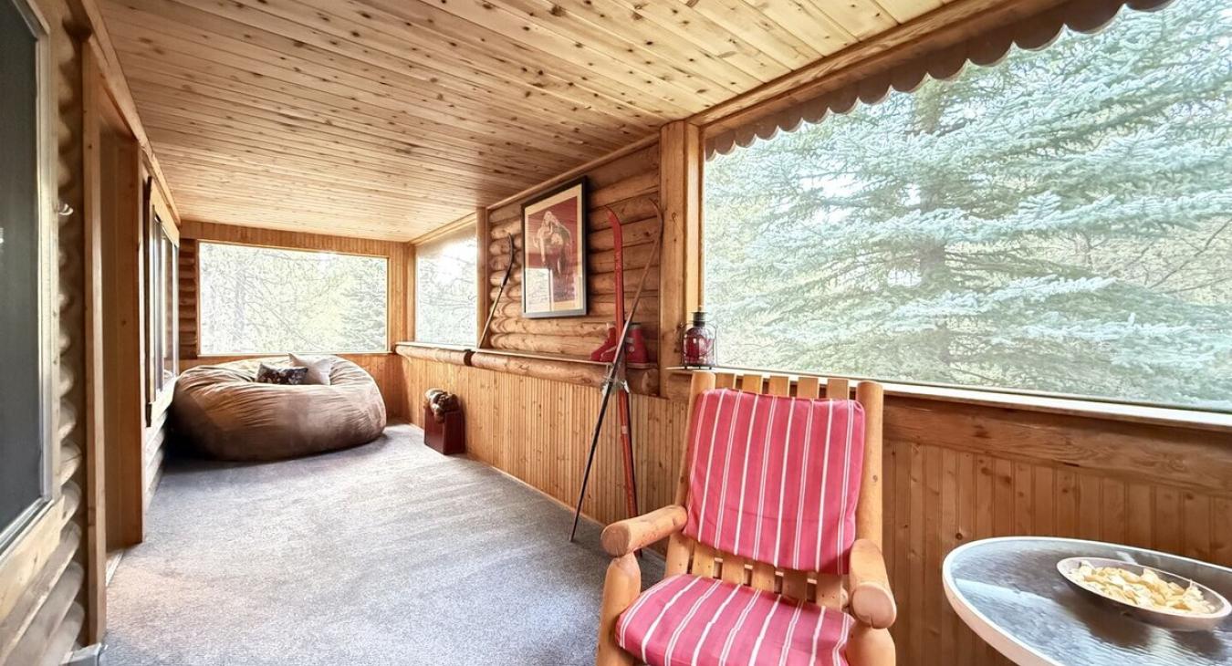 Beautiful large screened porch to enjoy the beautiful surroundings upstairs.