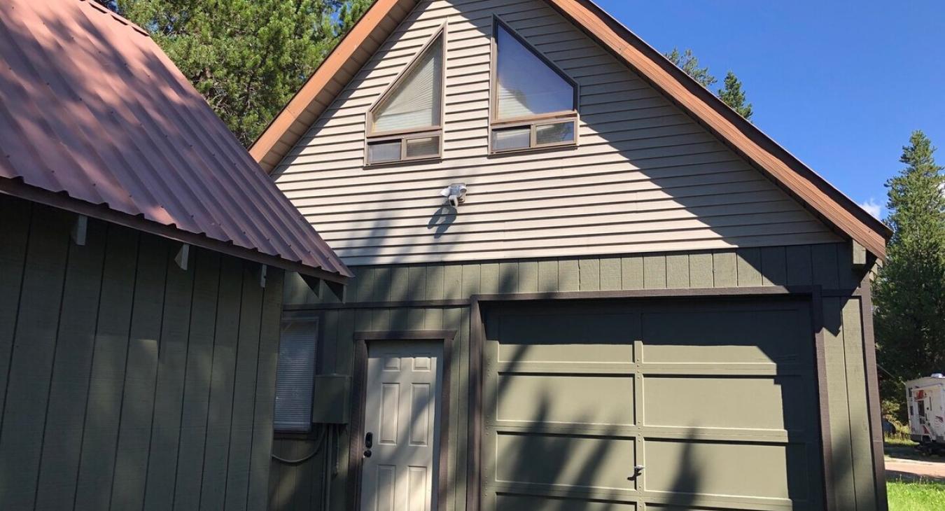 Cabin is located above the garage.