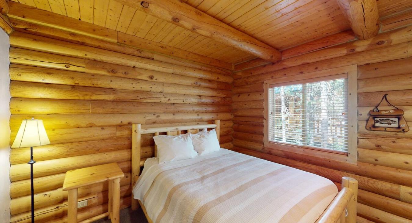 Bedroom #2 located on the main level with a Queen size bed.