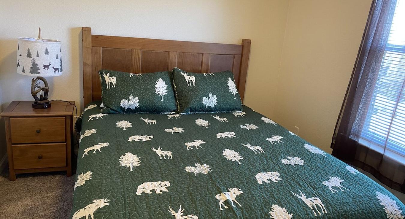 Bedroom #1 with a Queen size bed perfect for 2 people.