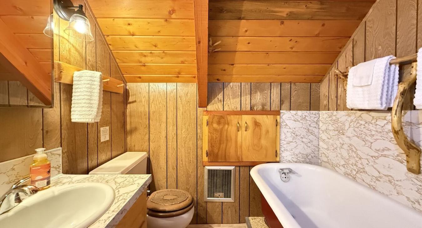 Upstairs 3/4 bathroom with bath tub only. Relax in the vintage claw foot bath tub.