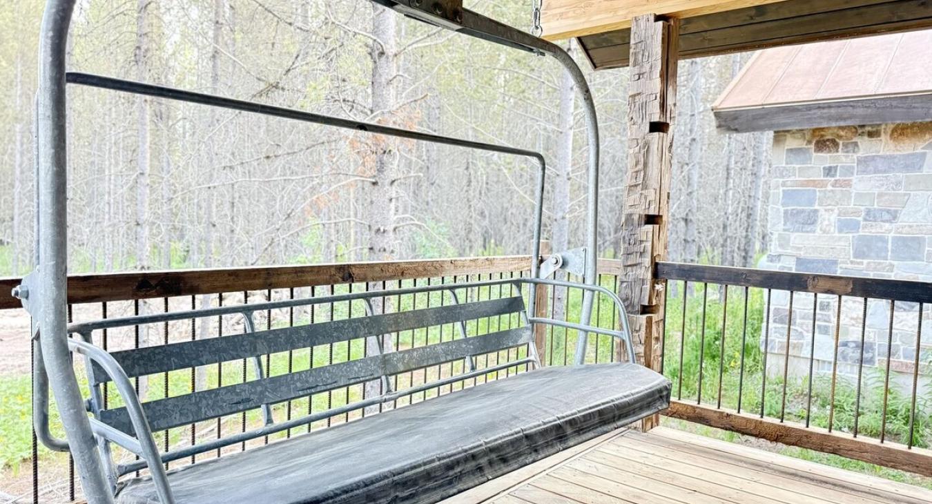 Sit on the porch on this vintage ski lift swing.