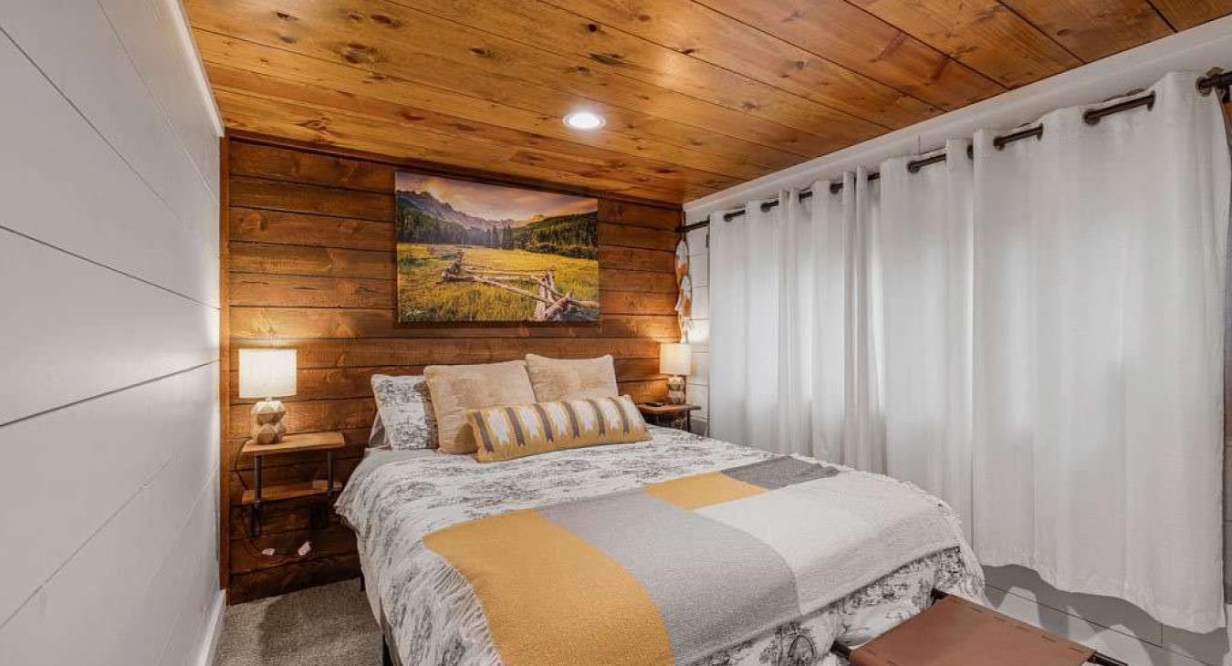 Bedroom #1 located on the main level with a Queen size bed.