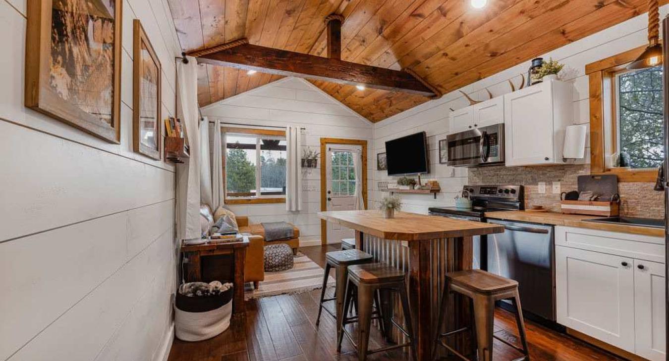 Kitchen and living room area is spacious for it being a tiny house.