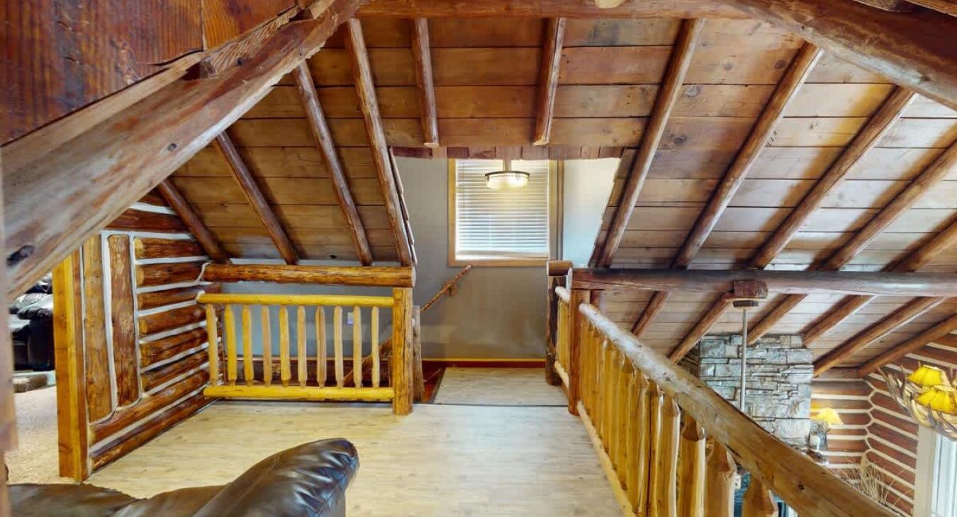 Loft with access to the downstairs.