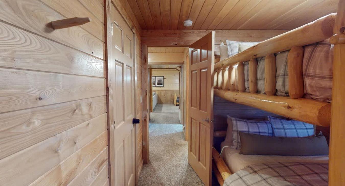 Bedroom #6 with a bunkbed with a Twin on top and Double on bottom.