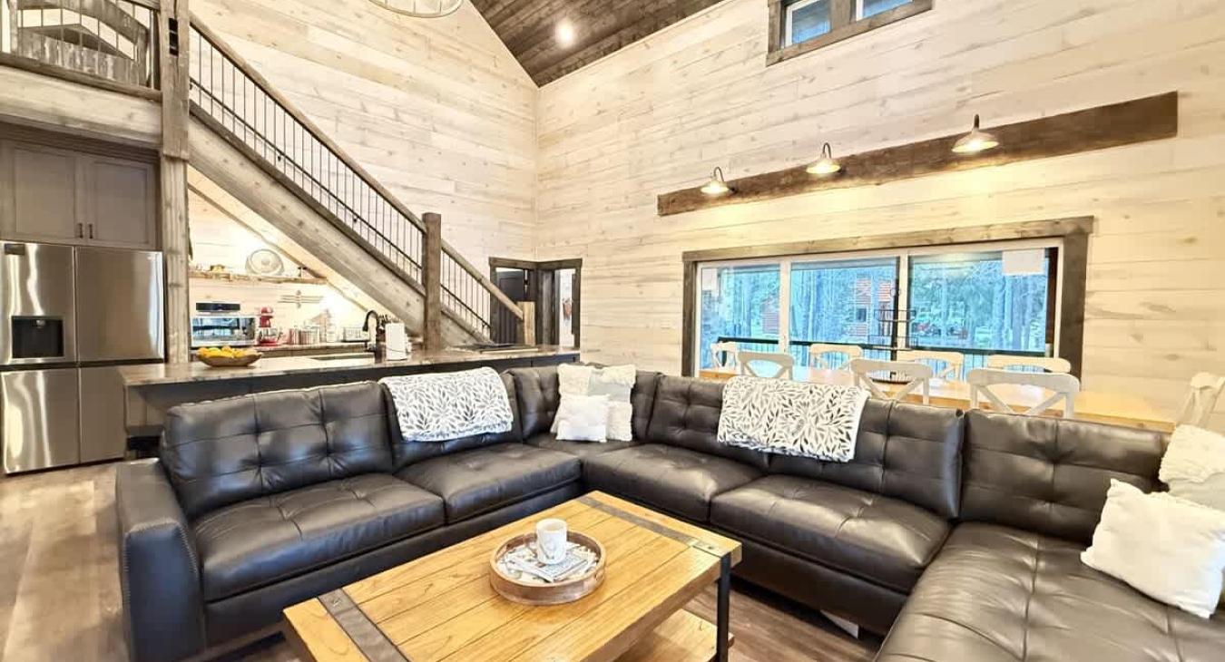 Living room to stairs view of the open floor plan.