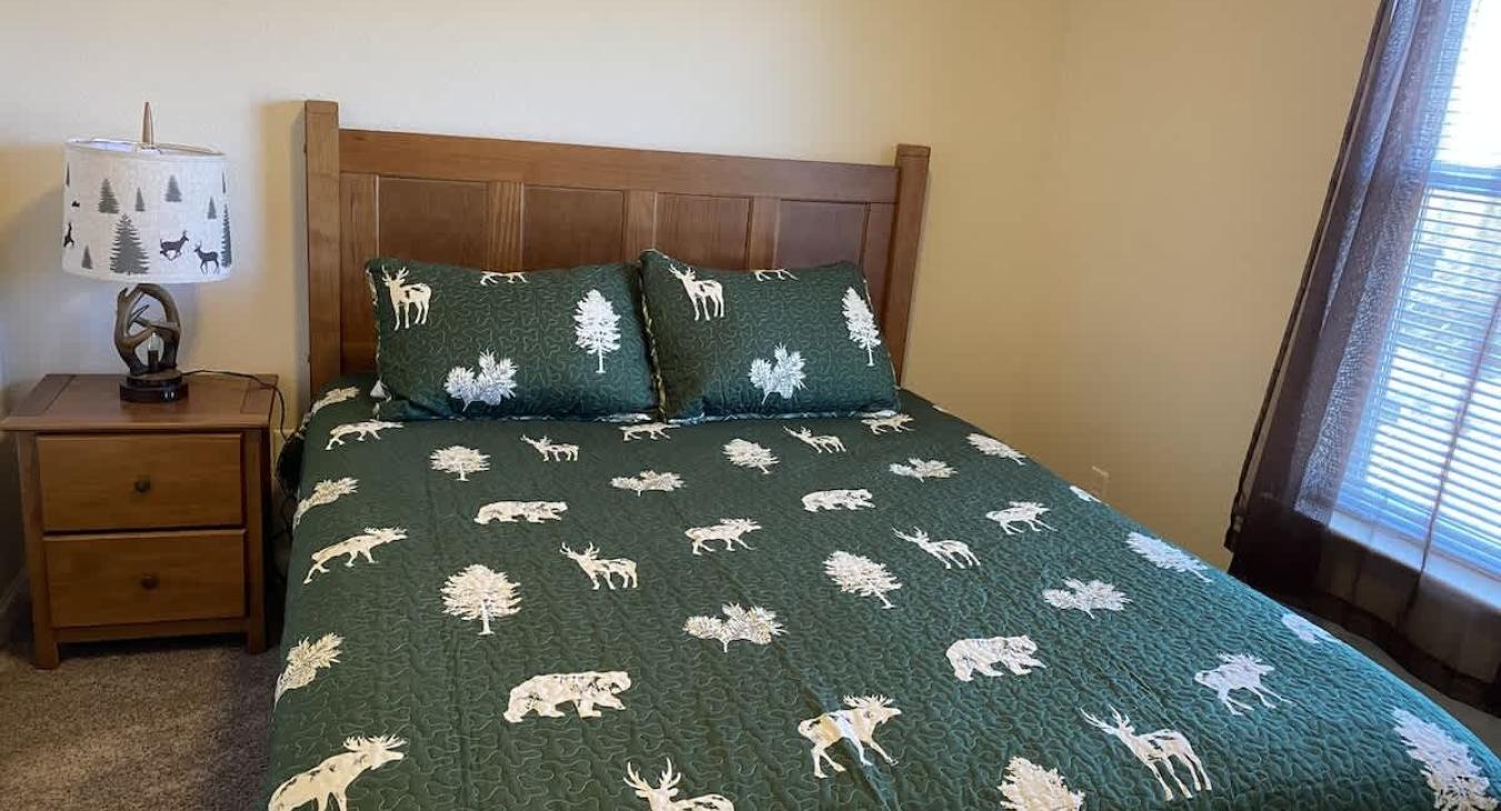 Bedroom #1 with a Queen size bed perfect for 2 people.