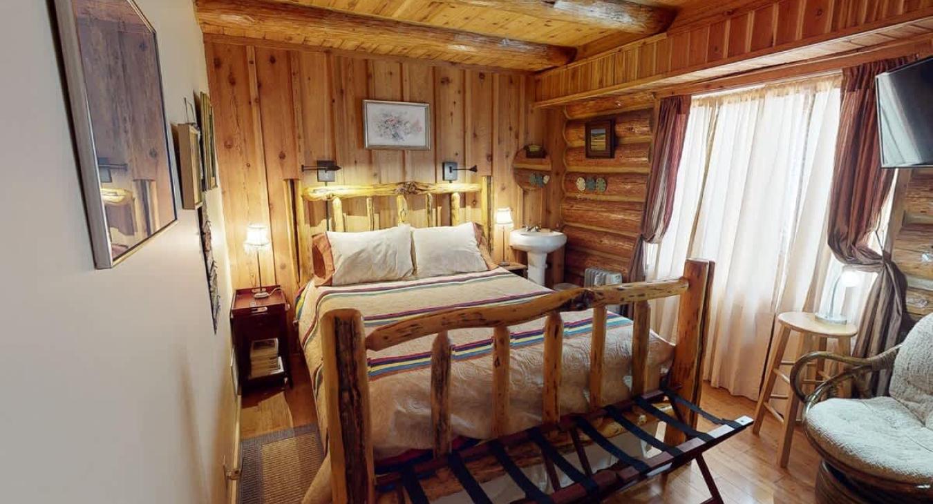 Bedroom #1 with a Queen size bed.