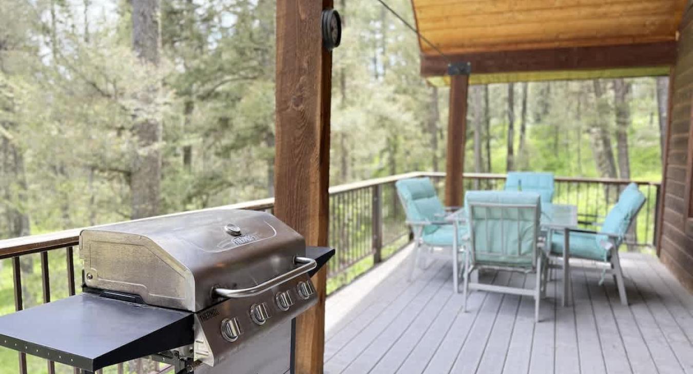 Deck with table for seating.