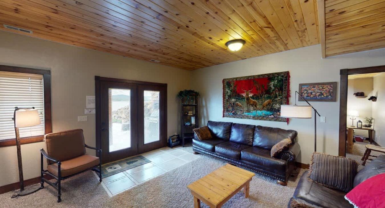 Access the grill area outside from the double doors pictured here.