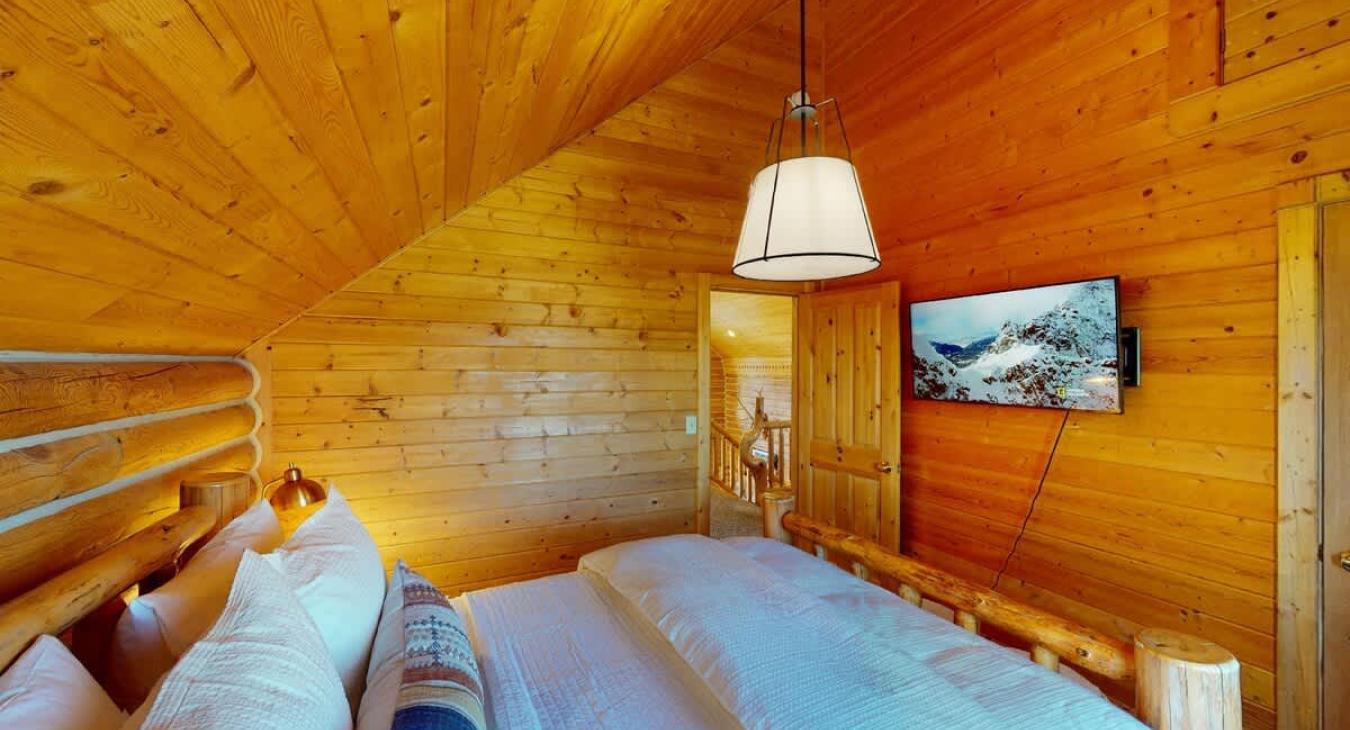 TV is located in the room for entertainment.