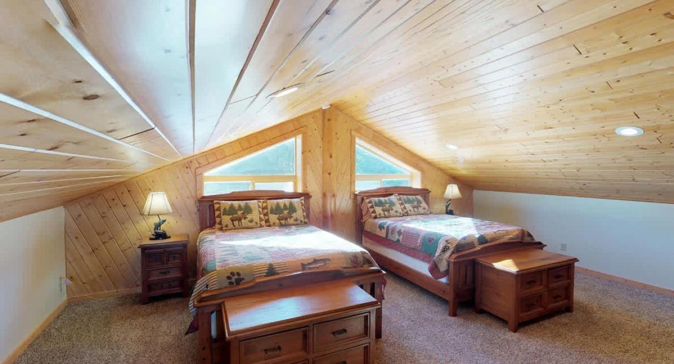 Upstairs loft with 2 queen beds. Perfect for up to 4 people.