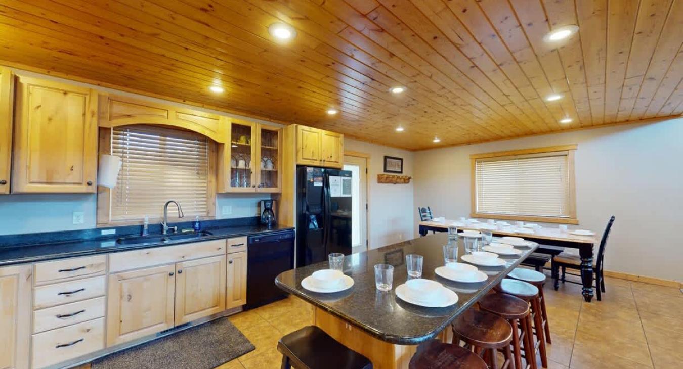 Full kitchen with seating for everyone.