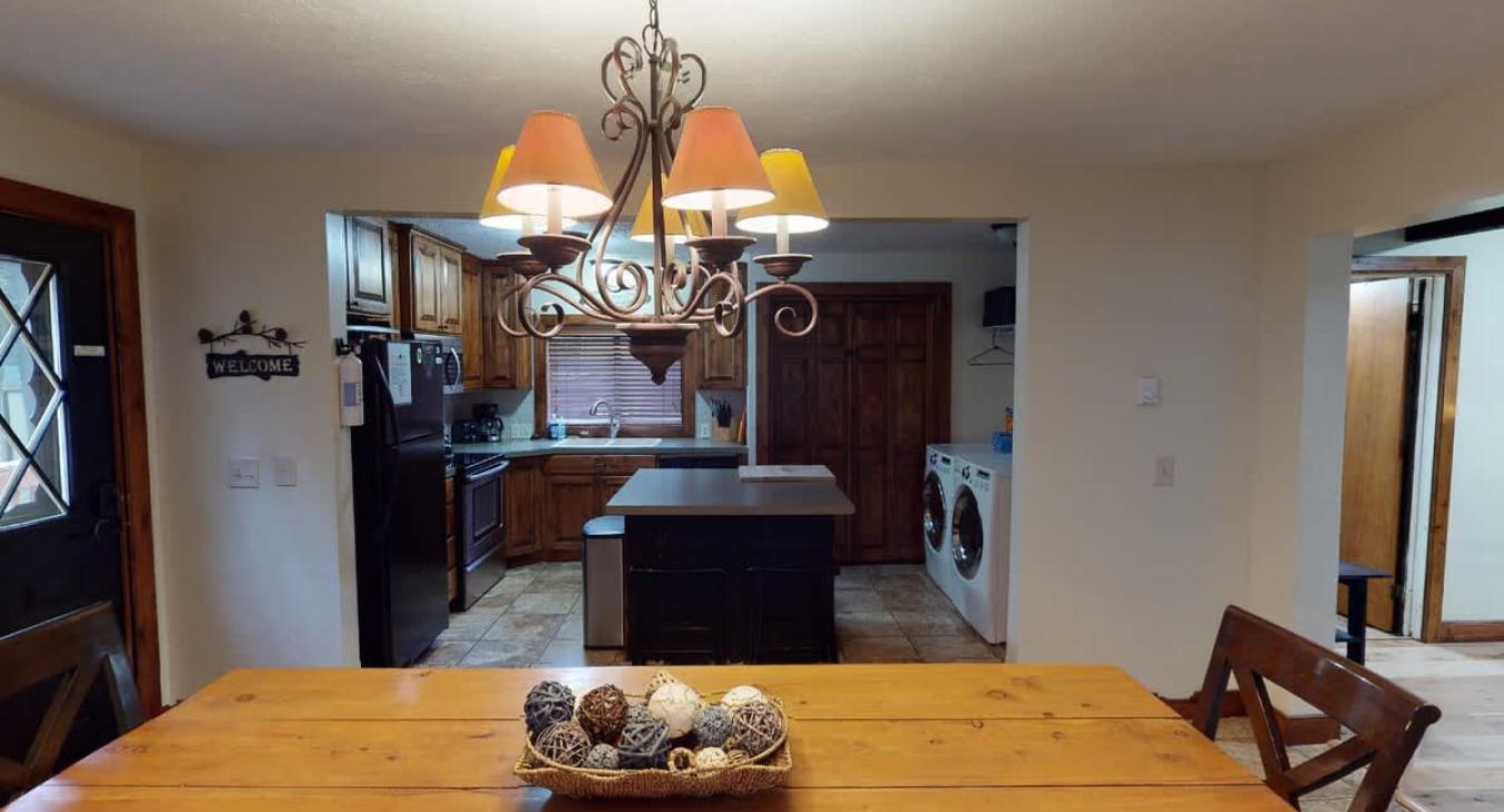 From the dining room you can view the kitchen.