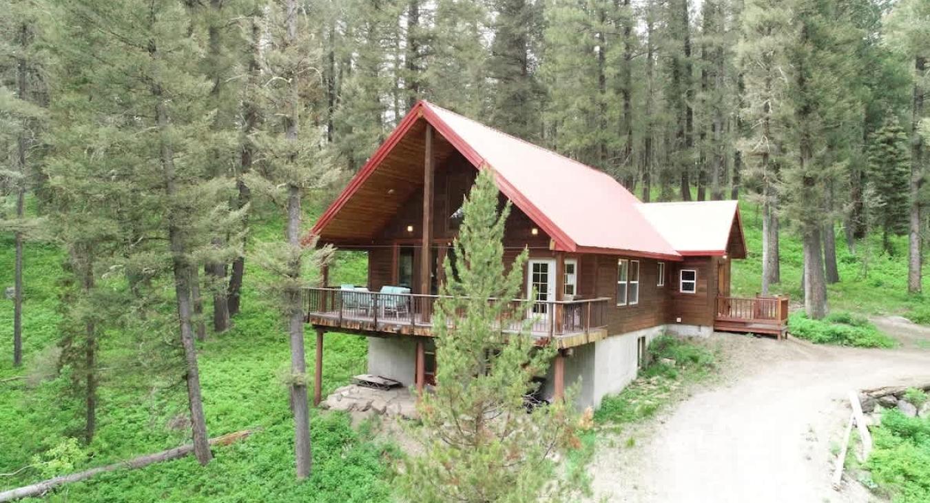 Beautiful view of log cabin near Yellowstone.