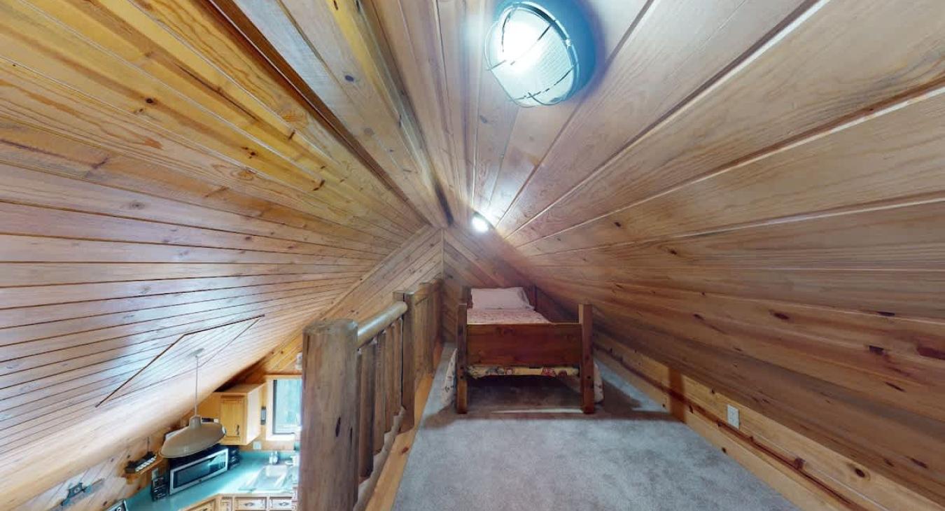 Loft area with 2 single beds.