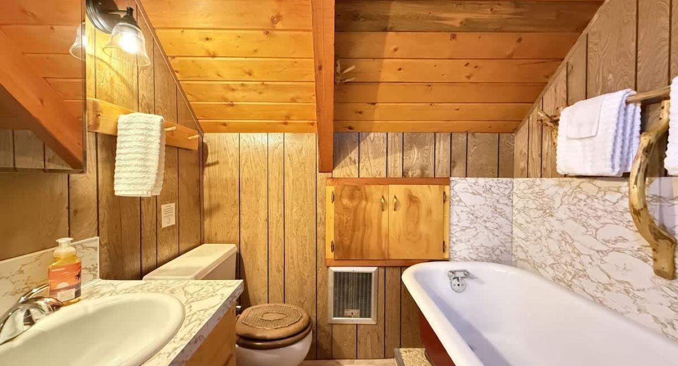 Upstairs 3/4 bathroom with bath tub only. Relax in the vintage claw foot bath tub.