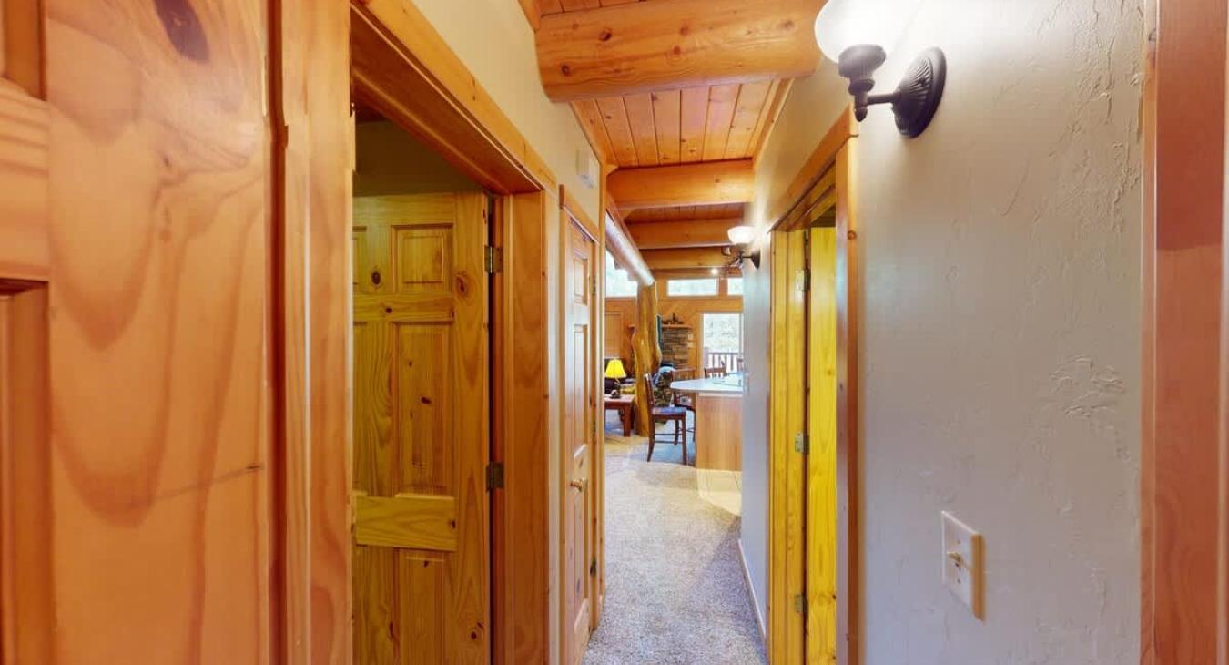 Hallway to access the kitchen and living area.