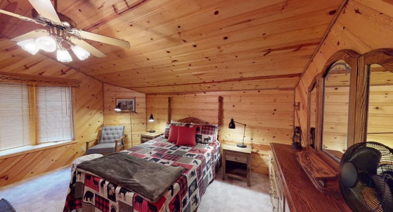 Bedroom #2 on the main level with a Queen size bed.