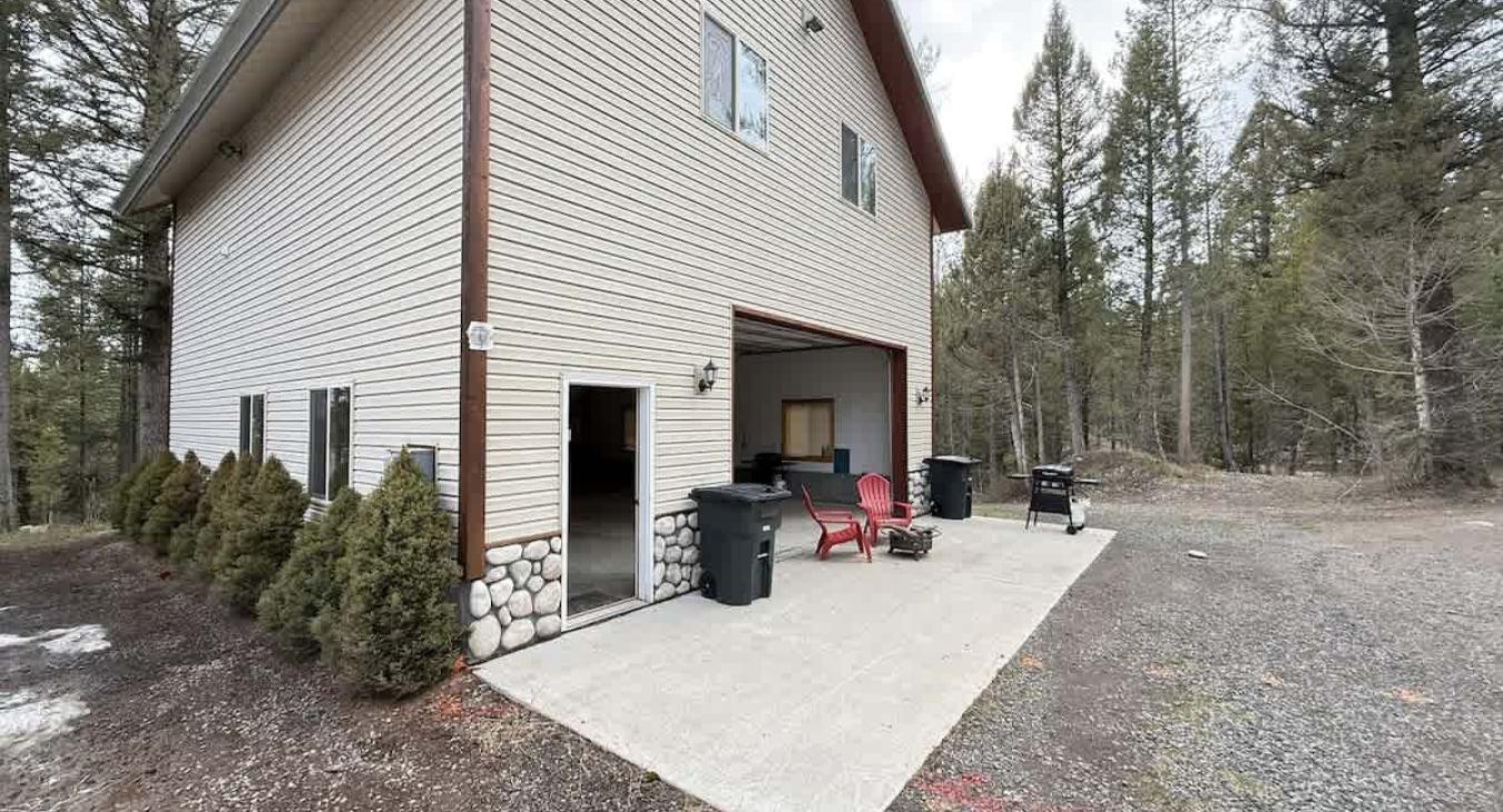 open garage with grill and firepit