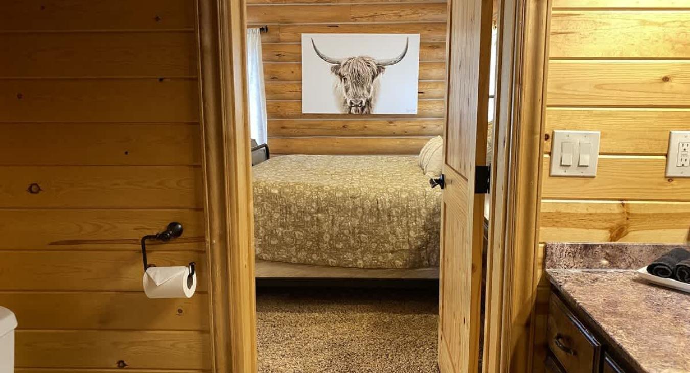 Upstairs in-between the two rooms is a shared Jack and Jill bathroom. It offers ample storage and counter space and a shower tub combo.