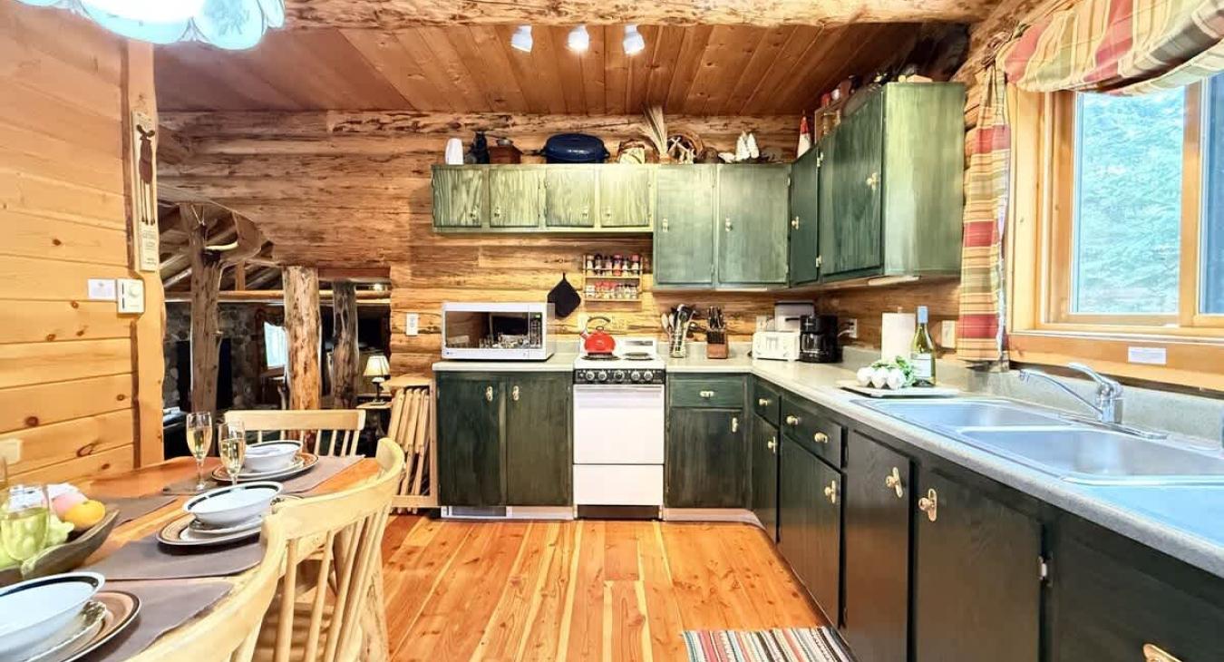 The kitchen is located adjacent to the living room.