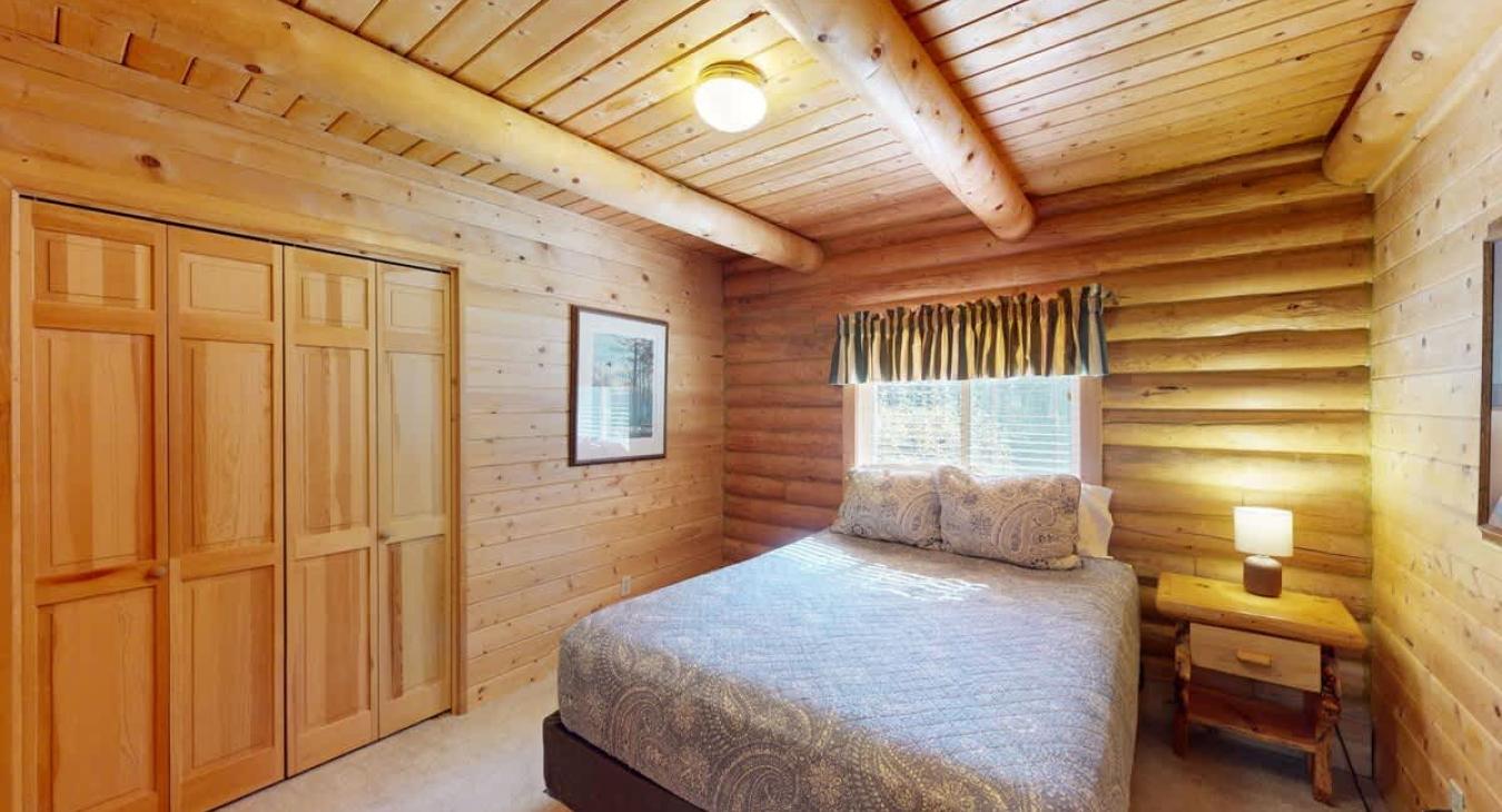 Large window in the room that lets in lots of natural light.