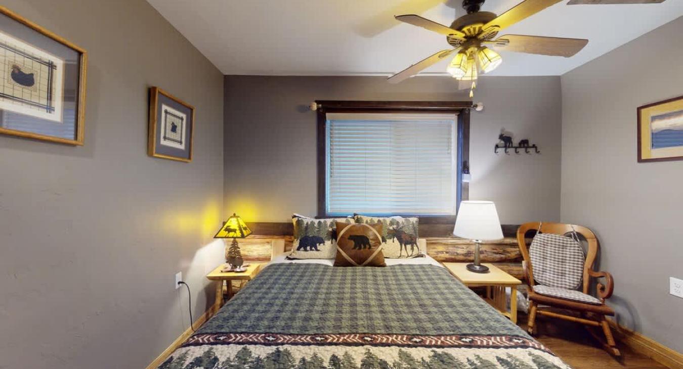 Bedroom #2 on the main level with a Queen size bed.